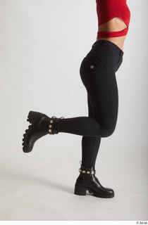  Zuzu Sweet  1 black boots black trousers casual dressed flexing leg side view 0009.jpg